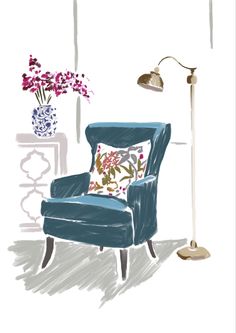 a blue chair sitting in front of a lamp next to a vase with flowers on it