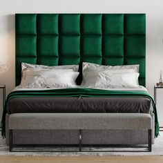 a large green headboard on top of a bed in a room with white walls