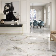 an elegant dining room with marble floors and white walls