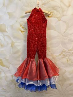 Gorgeous Red White Blue outfit - red sequins jumpsuit, romper with red, blue, white organza bell bottom.  Zipper back.  This outfit would be perfect for all important events such as Birthday, Party, Pageant, photo session.  Materials: sequins on velvet, organza, polyester. Colors and sizes. This outfit can be made in Red White Blue  colors in any size. Outfit is tailored to order in any standard size. The size chart is the picture of the listing. For custom outfit we would need: chest, waist, hi Red White And Blue Pageant Wear, Patriotic Wear For Pageants, Patriotic Pageant Wear, Summer Sleeveless Fitted Pageant Dress, Sleeveless Fitted Pageant Dress For Summer, Fitted Sleeveless Summer Pageant Dress, Summer Fitted Pageant Dress With Ruffles, Fitted Summer Pageant Dress With Ruffles, Summer Party Pageant Dress With Ruffles