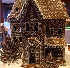 an elaborate gingerbread house is on display