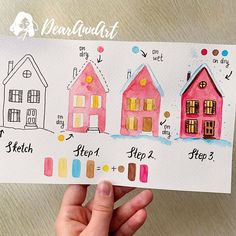 a hand holding up a piece of paper with houses on it and the words step by step written in different colors