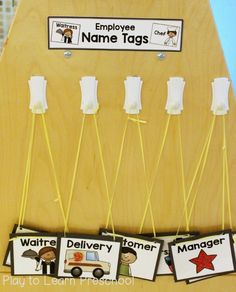 an employee name tags display in front of a bulletin board