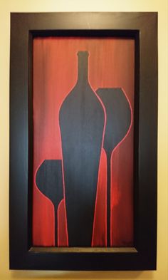 an abstract painting of two wine glasses and a bottle on a red background in a black frame