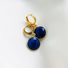 Blue Hoop Earrings For Gift, Blue Hoop Huggie Earrings Gift, Blue Huggie Hoop Earrings For Gift, Blue Huggie Hoop Earrings As Gift, Gold Sapphire Dangle Earrings, Gold Gemstone Dangle Hoop Earrings, Gold Dangle Hoop Earrings With Gemstone, Blue Gemstone Gold Plated Earrings, Gold Sapphire Earrings Gift