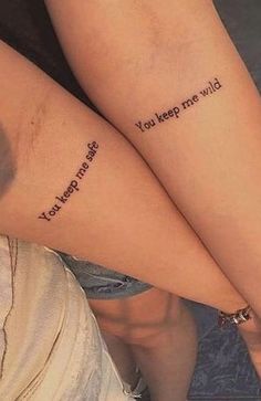 two people with matching tattoos on their legs