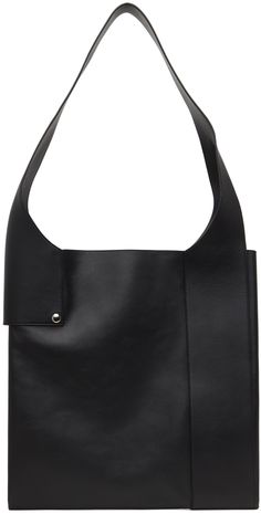 Grained leather tote in black. · Logo-embossed fixed shoulder strap · Two-compartment interior · Central zip pocket · Unlined · Silver-tone hardware · H10 x W10 x D1.5 · Total height: H21 Part of the A.P.C. x Natacha Ramsay-Levi collaboration. Supplier color: Black Modern Shoulder Bag With Leather Backing For Work, Designer Black Hobo Bag For Work, Modern Leather-backed Shoulder Bag For Work, Modern Leather Backed Shoulder Bag For Work, Chic Leather-backed Business Shoulder Bag, Office Shoulder Bag With Double Handle And Leather Backing, Modern Rectangular Hobo Bag With Leather Backing, Leather-backed Top Handle Shoulder Bag For Office, Leather-backed Double Handle Shoulder Bag For Work