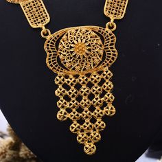 Afraic Jewelry- Ethiopian Gold Color African jewelry sets For Women Nigerian wedding Necklace earrings jewelry setModel Number:3256802567665927color: gold colorprocess:gold plating.guality:100% brand new /top qualitystyle:fashion accessories.design:dubai gold jewelry, bridal wedding jewelry.occasion:engagement / anniversary / party / gift. Gold Alloy Bridal Necklace, Gold Plated Filigree Jewelry In Gold, Traditional Gold Alloy Jewelry, Gold Bridal Necklace In Alloy, Festival Yellow Gold-plated Jewelry Sets, West African Gold Jewelry, Nigerian Necklaces, Multicolor Gold-plated Jewelry Sets For Gifts, Gold Jewelry Bridal