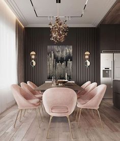 an elegant dining room with pink chairs and a chandelier hanging from the ceiling