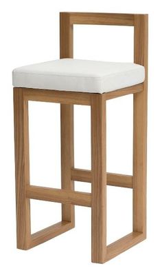 a wooden stool with a white cushion on the seat and backrest, against a white background