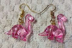 dinosaur earrings they are so cute Dinosaur Earrings, Pink Dinosaur, Jewelry Earrings Dangle, So Cute, Etsy Earrings, Dangle Drop Earrings, Dangle Earrings, Jewelry Earrings, Accessory Gift