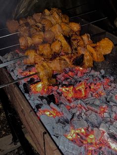 the food is being cooked on the grill