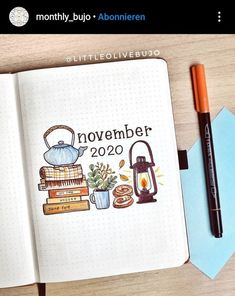 an open notebook with the words november written on it