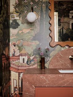 a bathroom with a sink, mirror and wallpaper on the walls in different colors