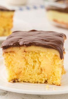 a piece of cake with chocolate frosting on a plate