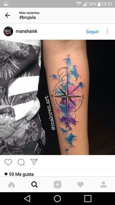 a person with a compass tattoo on their arm