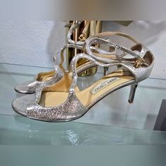 Nice Looking Silver Color Party Shoes, Jimmy Shoe, Size Is 8.5, Heel Measures 2.75". Chic Party Heels With Silver-tone Hardware, Jimmy Choo Rhinestone Heels, Party High Heels With Silver-tone Hardware, Grey Jimmy Choo Heels, Metallic Silver Heels With 4-inch Round Toe, Color Party, Jimmy Choo Shoes, Party Shoes, Women's Shoes Sandals