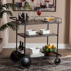 a bar cart with drinks and fruit on it