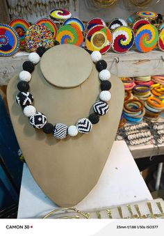 Do you intend to be creative in your dressing code and to be unique and at the same time standout as fashionable? Then look no more, We African 1 Stores brings to you the most colorful necklace to supplement your style and fashion.  Can be won on almost all occasions which includes Beach travels, Outdoor walks and adventures, Party and ceremonies. Designed to fit everyone WHOLESALE Join hundreds of sellers across the globe who buys ij wholesale from our store and sell in their physical store and or online stores. Kindly send us a message.  We supply to you at a wholesale price Ships from Nairobi Kenya to the rest of the world. Delivery is done via DHL EXPRESS Kenya to your doorstep To continue shopping more items of these kind: https://african1stores.etsy.com?section_id=43472317 Black Beaded Necklaces For The Beach, Black Necklaces With Colorful Beads For Beach, Black Necklaces With Large Beads For Beach, White Bohemian Necklace With Black Beads, Unique White Wooden Beads, Unique Large Beads Necklace For Beach, White Necklace With Black Beads For Beach, Unique White Beaded Choker Necklace, Unique White Round Bead Necklaces