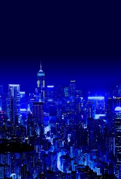 the city skyline is lit up at night with bright blue lights and skyscrapers in the background