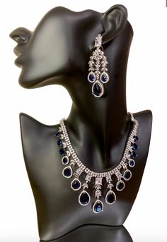 Add some sparkle to any occasion with our CZ American Diamond Necklace. Perfect for weddings, parties, or as a gift for her. This stunning necklace, made with beautiful bluestones, will elevate any outfit like sarees, gowns, or lehengas. Make a statement with this beautiful and versatile piece. This jewellery set includes a necklace and matching earrings. Jewellery Care- Keep the jewellery dry, avoid contact with perfumes and water. American Diamond Necklaces, Bridal Choker, Jewellery Set, American Diamond, Stunning Necklace, Ring Finger, Bridal Sets, Matching Earrings, Jewelry Care