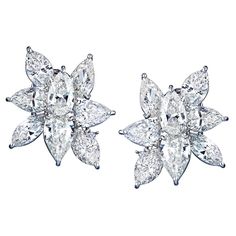 These stunning diamond earrings are exceptional in size, quality and brilliance. Nothing basic about these that's a guarantee! Your ear lobe will be encrusted with large cluster diamonds of a significant size: 6 Marquise cuts totaling 6.53cts and 10 pear shapes totaling 12 carats. Average color G. Average clarity VS1, VS2, SI1 About 3cm long. A clip on closure post can be added for extra security. Pear Shapes, Crystal Cluster Earrings, Emerald Cut Diamond Ring, Diamond Cluster Earrings, Baroque Pearl Earrings, Diamond Jewelry Designs, Indian Wedding Jewelry, Marquise Cut Diamond, Pear Shaped Diamond