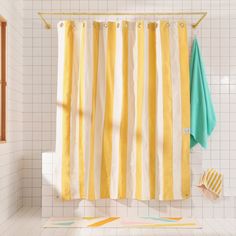 Catalina Canyon front view of curtain hanging in a bathroom. Canvas Curtains, Yellow Shower Curtains, Mirror With Hooks, Occasional Seating, Striped Shower Curtains, Media Cabinet, Wall Accessories, Bed Desk, Stylish Bathroom