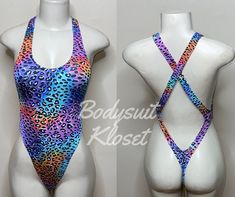 Welcome to my shop Let's Make Money Together 💕 DETAILS  * Handmade Item  * Materials: Nylon, Spandex * Full Bodysuit  * Never used  DESCRIPTION  * Thong Bodysuit  * Multicolored Cheetah Print Spandex * 4 way stretch Fabric  * Mannequin is wearing XS/Small (may choose sizing at checkout) SHIPPING  My current shipping turnaround is really quick 1 to 2 days  RETURNS & EXCHANGES  No refunds or exchanges if you have any issues with your purchase please feel free to reach me personally. I can accommo Summer Rave Fitted Leotard, Fitted Multicolor Backless Bodysuit, Summer Festival Dancewear Bodysuit, Fitted Rave Bodysuit For Swimming, Fitted Rave Bodysuit For Beach, Fitted Rave Bodysuit For The Beach, Full Bodysuit, Club Attire, Full Body Suit