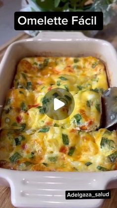 a casserole dish with cheese and vegetables in it