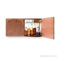 an open wooden cabinet with bottles and liquors in it on a white background that appears to be made out of wood