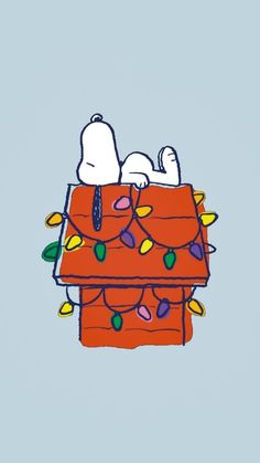 snoopy and his friends are sitting on top of the christmas tree with lights all around them