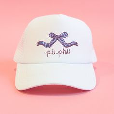 a white hat with the word pu - piu on it and a bow at the front