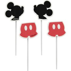 three mickey mouse lollipops are shown in black, red and white colors