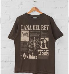 Lana Del Rey Vintage T-shirt, Lana Del Rey Shirt, Lana Del Rey lyric Shirt Lana Del Rey T-Shirt, Gift for men, women Unisex T shirt The unisex heavy cotton tee is the basic staple of any wardrobe  It is the foundation upon which casual fashion grows.  All it needs is a personalized design to elevate things to profitability.  The specialty spun fibers provide a smooth surface for premium printing vividity and sharpness.  The shoulders have tape for improved durability. * 100% ring-spun cotton * D Lana Del Rey Tshirt, Lyric Shirts, Clothing Wishlist, Neue Outfits, Color Charts, Really Cute Outfits