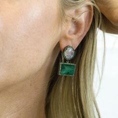 With their earthy elegance and vibrant combination of colors, these earrings also add a playful sophistication to any collection. The slightly domed malachite and faceted rainbow moonstone are framed by sparkling tsavorite stones. As casual or as dressy as you like, these earrings exude a playful, sophisticated style. Total length : 30mm malachite stone : 15mm x 12mm You might also like: https://www.etsy.com/listing/649858864/diamond-eearrings-crystal-quartz-and?ref=shop_home_active_22 Wear thes Fusion Green Earrings With Natural Stones, Green Fusion Earrings With Natural Stones, Green Drop Earrings With Gemstone Accents, Green Natural Stones Fusion Earrings, Green Natural Stone Fusion Earrings, Jewel Tone Earrings, Malachite Earrings, Malachite Stone, Sparkly Earrings