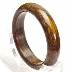 Store Categories Store Categories Other Jade Handmade 100% Natural High Quality Brown JADE Bangle Bracelet UK Seller Product Description Product Description size(Appro   56-62mm Quantity:   1pcs length:    Clasp: . Shipping & Handling: Normally delivery time is about 15-30 working days. To get the shipping discount and invoice, Just simply wait until all of the auctions have ended, and complete the checkout from the most recent Email or any auction page after you finish bidding. Payment Policy: 1. Paypal   (payment through paypal is safe and quick ) If you are the final winner of this item, please pay for it within 7 days. However, if you are still bidding on our other auctions and want to ask us to combine shipping for you, just disregard the payment notice sent by Paypal and let us know Affordable Jade Bangle Jewelry, Elegant Jade Bangle, Luxury Carved Jade Bangle, Bangle Stack, Jade Bracelet Bangles Chinese, Carved Green Jade Bangle, Jade Bangle Bracelet, Jade Bangle, Natural High