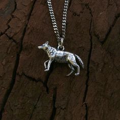 "This beautifully detailed little wolf necklace is completely 3D. It is made of solid sterling silver. This wonderful little wolf is only 1\" across, the perfect size  for an everyday piece that looks great alone or in combination with other necklaces.  ALTERNATIVE STYLES: I make a variety of different animal designs in a number of finishes to suit all styles, tastes and pocketbooks, check them out here:  http://www.etsy.com/shop/mrd74?section_id=5776054 MOON RAVEN DESIGNS: Please check out the Remembrance Necklaces, Button Studs, Wolf Necklace, Wolf Jewelry, Jewelry Care Instructions, Grey Wolf, Charm Pendant Necklace, Hand Cast, Bracelets And Charms