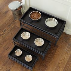 three elevated dog bowls on top of each other