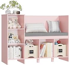 a pink book shelf filled with books and stuffed animals