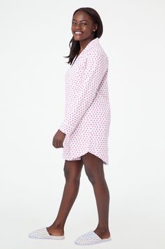 You sleep better in cute pajamas — it's science. The Perlita Lounge Dress is a super soft cotton nightshirt with a button front and front pocket. The pink hearts print adds a fanciful touch to a classic sleep style. 6 Buttons Front Patch Pocket Materials and Care 100% Long-Staple Premium Cotton Machine Wash Cold, With Like Colors Do Not Bleach, Tumble Dry Low (Line Dry Recommended) Imported Measurement Information Model Wears Size Small Size S Length: 34.5" (from Shoulder) Size S Sleeve Length: Hearts Print, Roller Rabbit, New Heart, Baby Pajamas, Heart Quilt, Cute Pajamas, Lounge Dress, Sleep Better, Pink Hearts