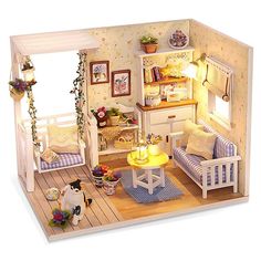 a doll house with furniture and accessories in it