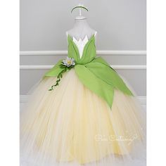 This long skirt Princess Tiana and Frog Dress is our new model, perfect for birthdays, Tiana themed parties, Halloween, pageants and any other special occasions. The Tiana Costume for Birthday is our own design and make, elaborately handmade with love using highest quality crystal satin, satin, greek tulle and dream tulle. It has satin lining all over the bodice to prevent irritation to the delicate skin of your princess and has a built in hoop style petticoat. The frog princess dress has lace u Sia Costume, Tiana Frog, Frog Dress