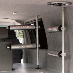 the inside of a van with metal bars