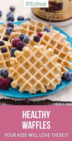 healthy waffles with blueberries and raspberries on the side