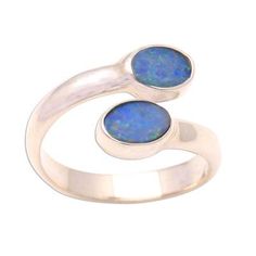 Set in sterling silver two radiant gems are never apart. Caine selects the mystique of opal for this extraordinary handcrafted ring. Because he uses natural gems the shape of the stones can vary. .925 Sterling silver Handcrafted Rings, Wrap Rings, Gemstone Rings, Opal, Gems, 925 Sterling Silver, Sterling Silver, Stone, Gemstones