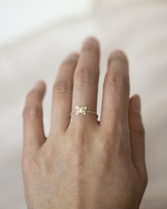 "Dainty 14k gold butterfly chain ring Made with 14k solid gold and 7mm butterfly Dainty light chain ring style \"Just like the butterfly, I too will awaken in my own time.\" ■ SHIPPING UPGRADES You can find shipping upgrades options in the drop bar menu when you check out. * Within the U.S Regular First-class : 2-6 business days Priority : 2-3days Express : 1-2 days * International International Priority : 6-10 Business days Rush International Express : 3-6 business days * Our current processing Yellow Gold Butterfly Charm Jewelry For Everyday, Minimalist Gold Butterfly Ring For Wedding, 14k White Gold Butterfly-shaped Jewelry, Fine Jewelry Butterfly Shape For Wedding, Yellow Gold Jewelry With Butterfly Charm For Everyday, 14k White Gold Butterfly Jewelry, Everyday Yellow Gold Jewelry With Butterfly Charm, Fine Jewelry Butterfly Piece For Wedding, Wedding Fine Jewelry Butterfly Shape