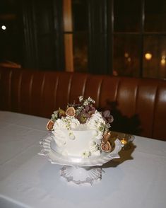 a white cake sitting on top of a table