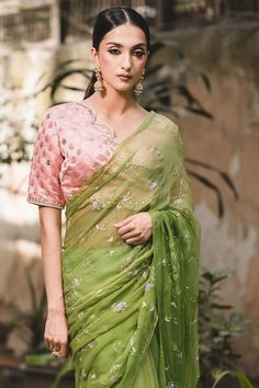 Light green chiffon saree with floral zari embroidery all over. Comes with unstitched blouse piece. 
Components: 2
Pattern: Embroidered
Type Of Work: Floral
Fabric: Chiffon
Color: Green
Other Details: 
Floral embroidery
Note: The stitched blouse worn by the model is not for sale
Occasion: Destination Wedding - Aza Fashions Green Chiffon Saree, Zari Saree, Zari Embroidery, Embroidered Saree, Types Of Work, Chiffon Saree, Floral Chiffon, Blouse Piece, Floral Fabric