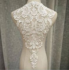 Super Luxury Lace Appliques Ivory Exquisite Lace Applique For Wedding Dress Grown Bridal Veil Bodice Size of 1 pcs : 32cm* 53cm , in inch : 12.2 * 20.4 The listing is for 1 pc. ♥It will be perfect for bowknot hairpin, baby clothes, sleeve edge, skirt edge, corsage and so on ♥Wholesale acceptable! ♥If you want more, please feel free to send me a message. I will be glad to make custom listing for you! ♥Happy shopping here sdyhttps://www.etsy.com/shop/beautyfabric Luxury Embroidered Lace For Wedding, Luxury White Lace With Lace Sleeves, Luxury Lace Trim Wedding Dress, Luxury Cream Lace For Women, Luxury Romantic Lace For Wedding, Luxury Cream Lace Dress, Luxury Beige Wedding Corset Dress, Luxury Embroidered Lace For Ceremony, Luxury Lace Patchwork For Ceremony