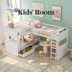 a child's bedroom with green walls and white furniture